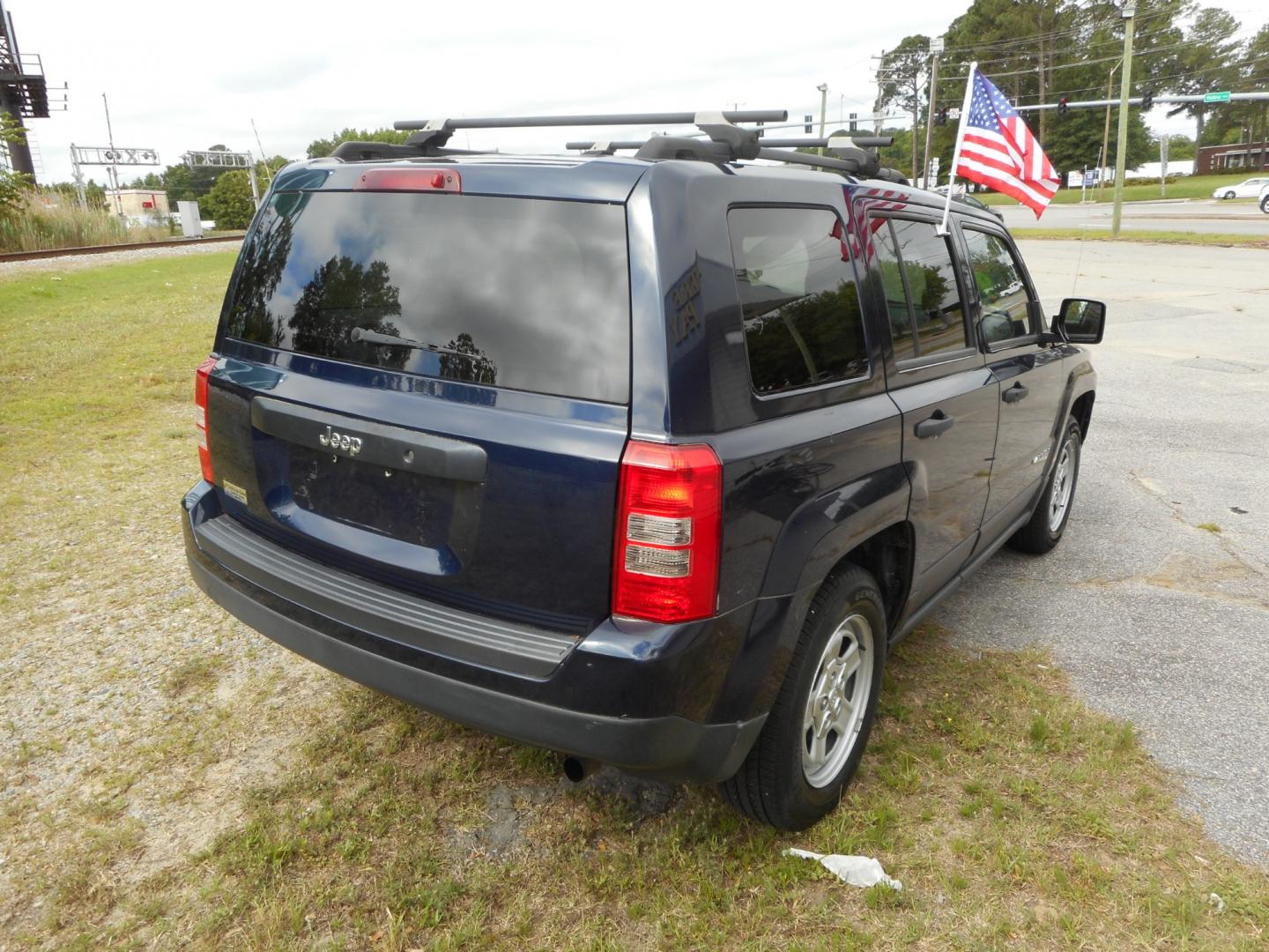 2014 Blue Jeep Patriot Sport 2WD (1C4NJPBA5ED) with an 2.0L L4 DOHC 16V engine, located at 2553 Airline Blvd, Portsmouth, VA, 23701, (757) 488-8331, 36.813889, -76.357597 - ***VEHICLE TERMS*** Down Payment: $999 Weekly Payment: $90 APR: 23.9% Repayment Terms: 42 Months *** CALL ELIZABETH SMITH - DIRECTOR OF MARKETING @ 757-488-8331 TO SCHEDULE YOUR APPOINTMENT TODAY AND GET PRE-APPROVED RIGHT OVER THE PHONE*** - Photo#5